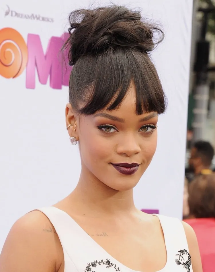 rihanna bangs_bun with bangs