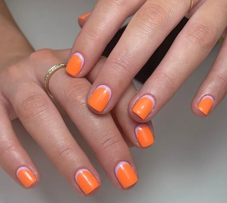 short spring nails 2023 orange manicure neon trends