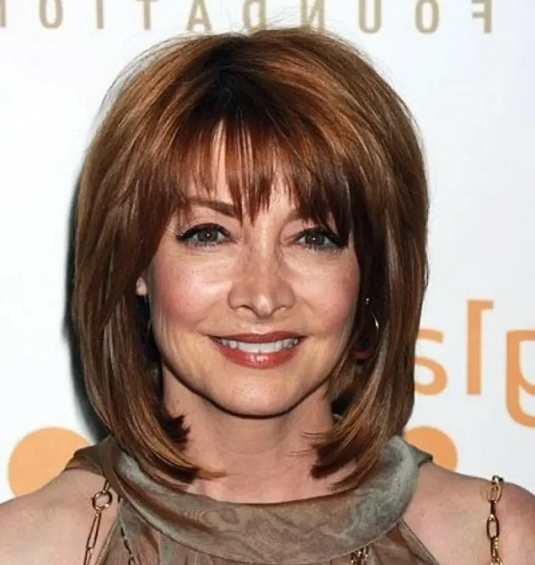 shoulder length hair with bangs over 50