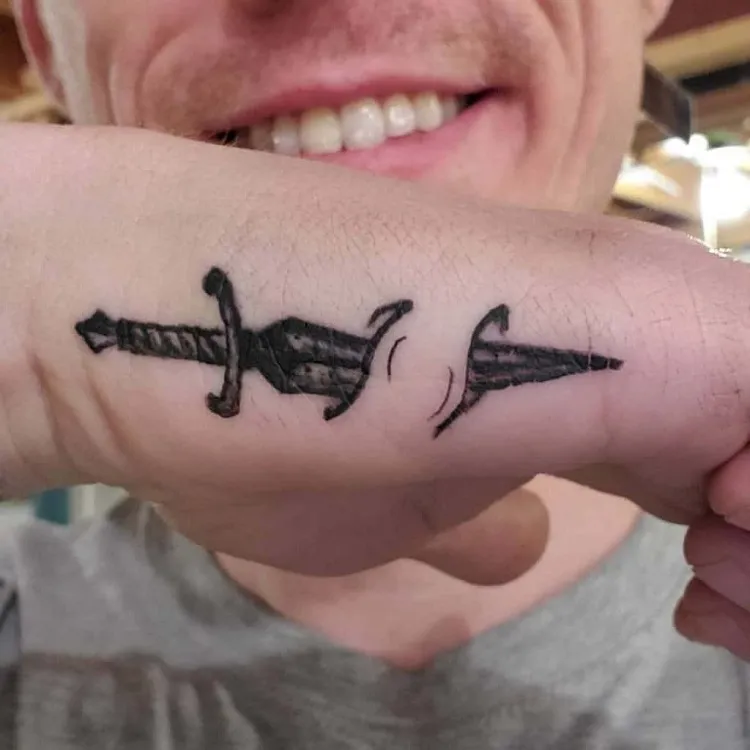 side hand sword tattoo for men