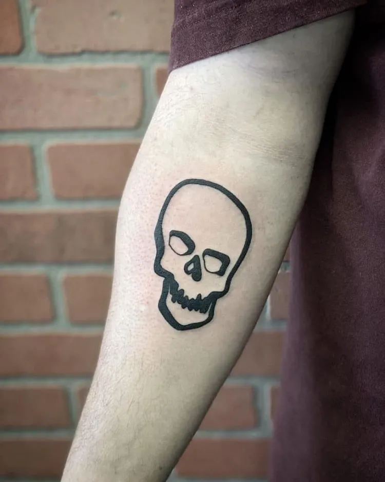 simple skull arm tattoo men
