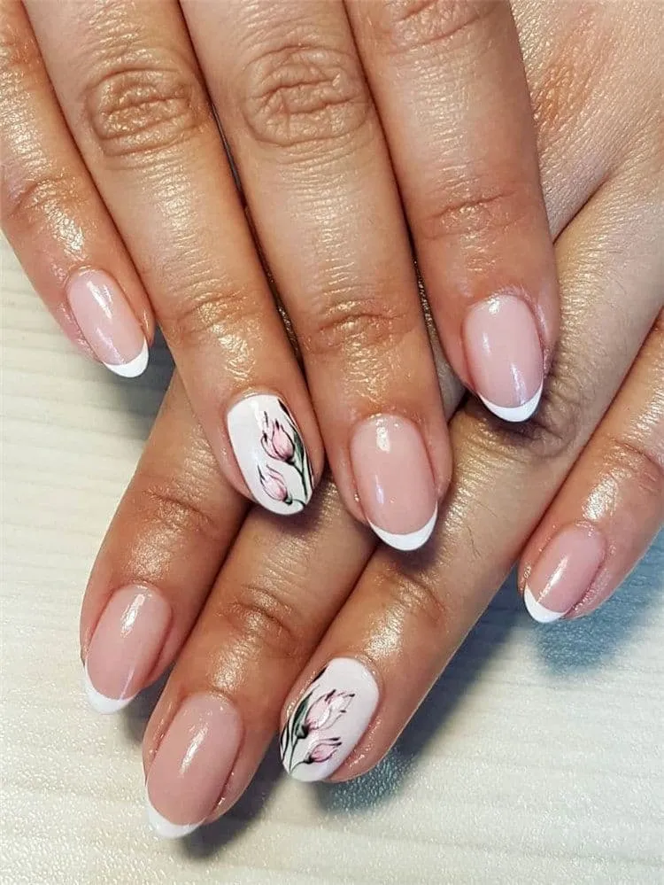 spring white french manicure with flower decorations