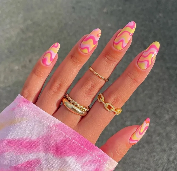 swirl nails 2023 colorful manicure pink and yellow