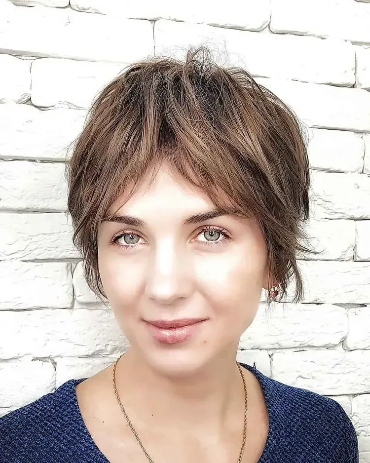 trendy hairstyles for spring 2023 short hair with curtain bangs