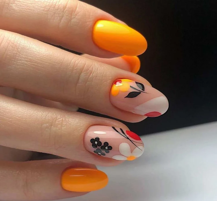 trendy orange nails spring 2023 cute floral elements