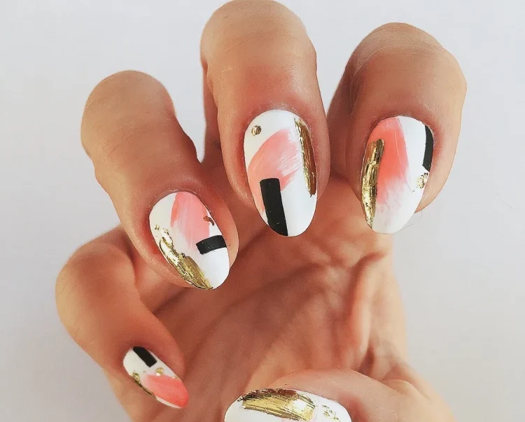 white pink gold and black abstract nail art design
