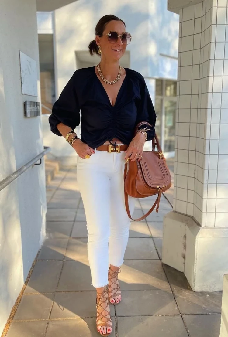 black top and white jeans outfit for women over 50