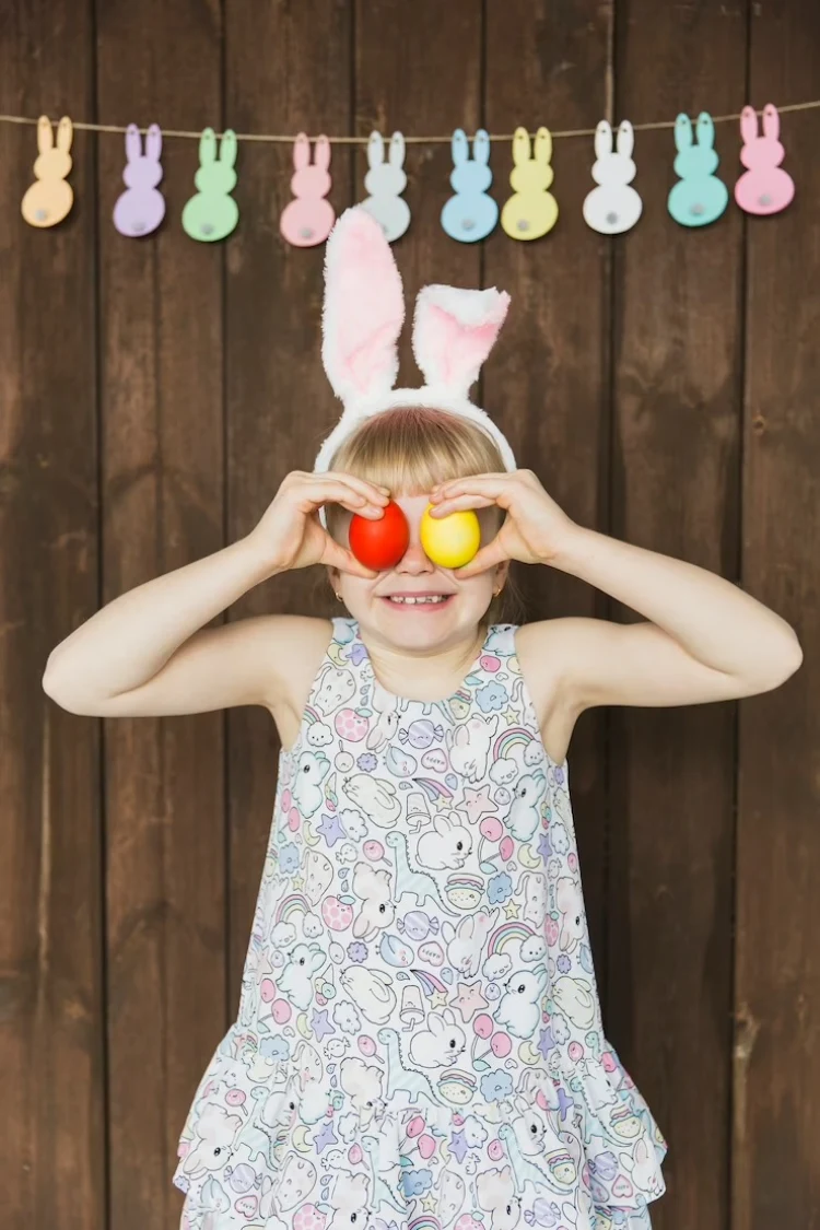 easter spirit child holding eggs bunny garland cute dress