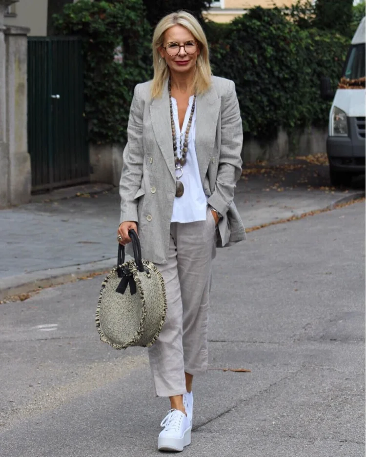 linen suit for effortless chic look and white sneakers for women over 50