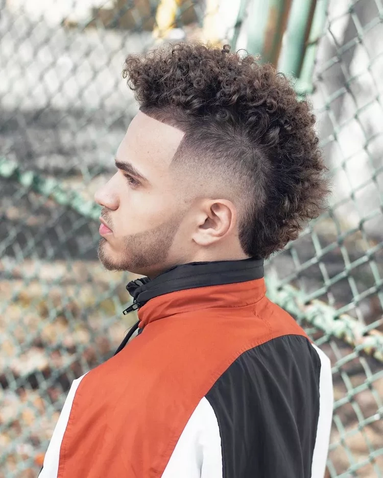 trendy hairstyles for men curly faux hawk with fade