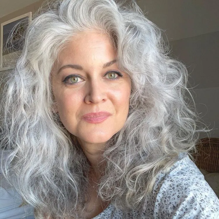 voluminous curls for long silver hair trendy long gray hairstyles