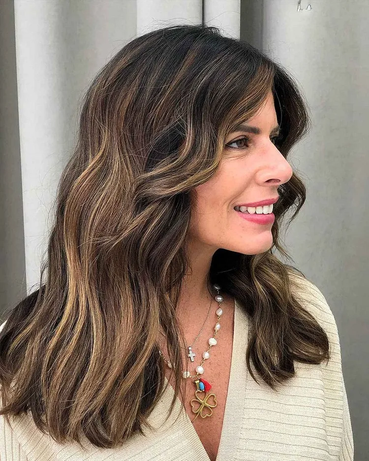 what to consider before getting a balayage women with long dark hair with brown highlights