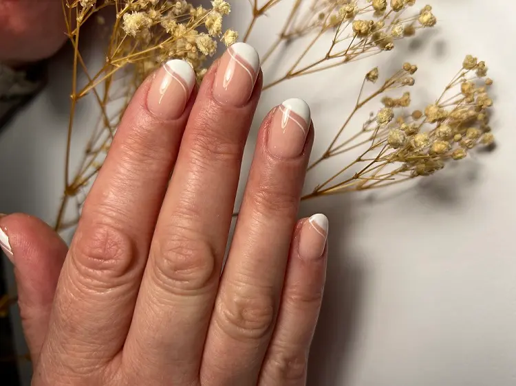 asymmetrical french manicure for women over 50 short square nails