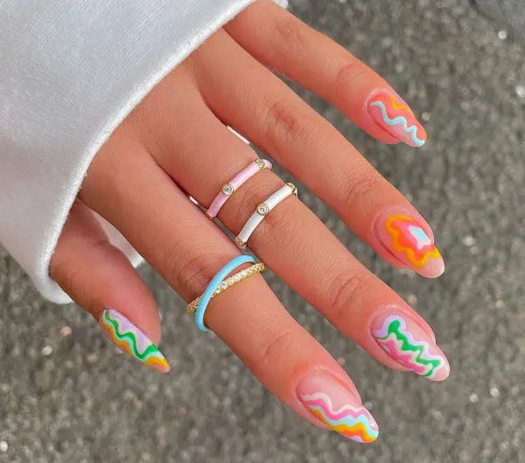 aura nails 2023 abstract manicure spring trends