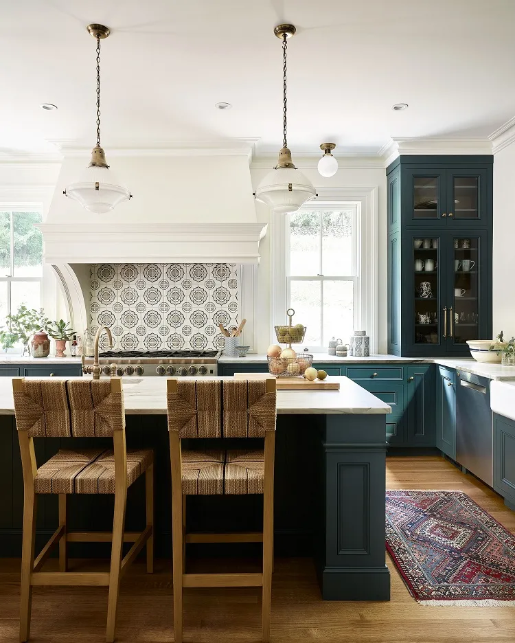 azulejo tiles backsplash dark petrol green cabinets natural materials wooden bar stool california cool kitchen design