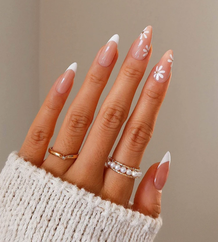 beautiful french nails and flowers minimalistic manicure