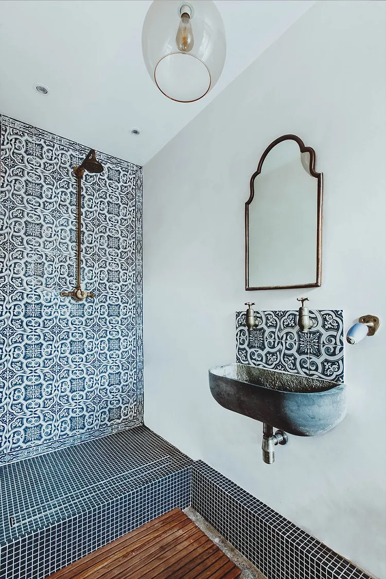 blue azulejo portuguese tiles bathroom design brass elements