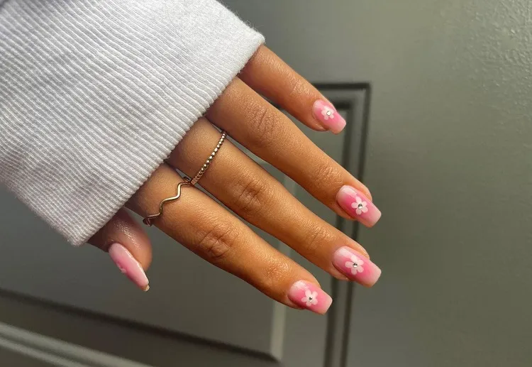 blush nails with flowers and rhinestones 2023