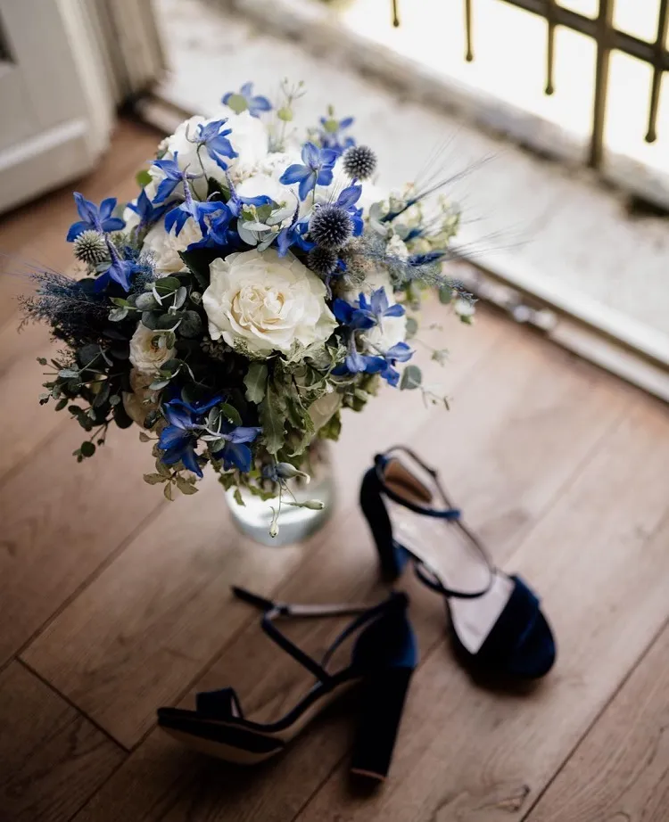 bridal bouquet with blue flowers wedding decoration ideas planning trends 2023