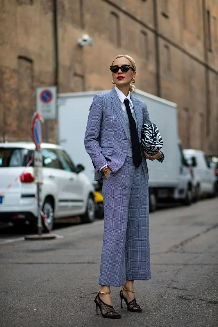 classic checkered three piece trouser suit for women white shirt black tie zebra print bag high heel sandals milan fashion week