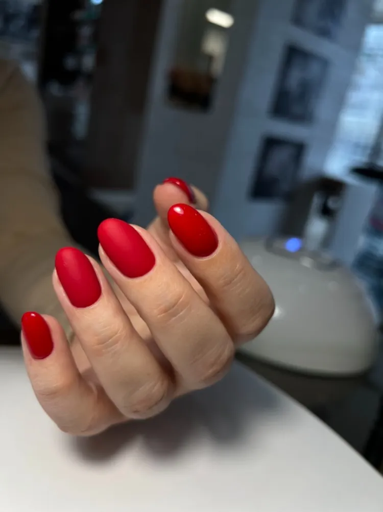 classic red matte top coat oval shape nails design ideas for women over 50