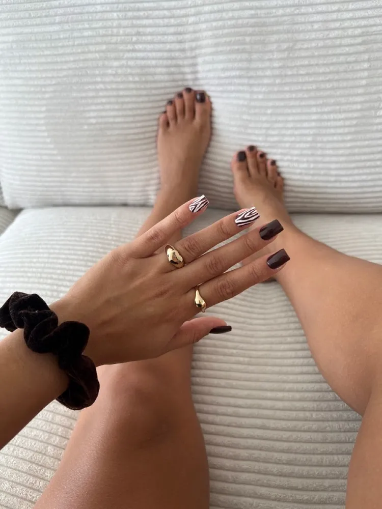 coordinated animal pattern manicure dark brown pedicure aesthetic minimalist design