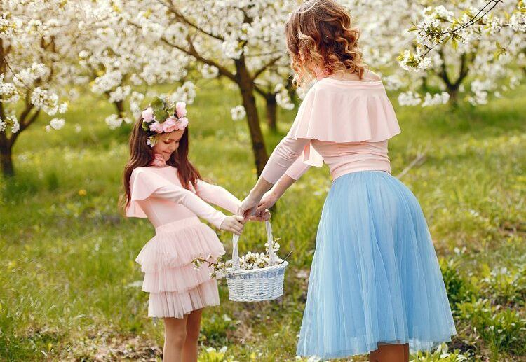 cute and stylish family in a spring park