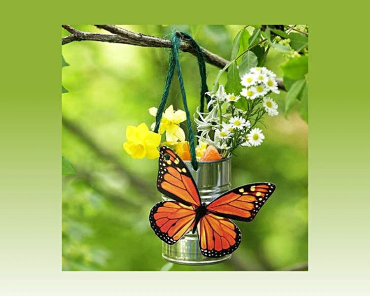 diy butterfly feeder simple idea with an empty can and flowers