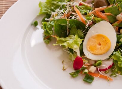 easter vegetable dishes a salad with carrot green salsd and green onion