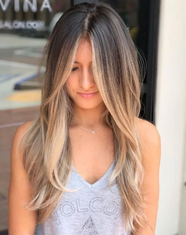 face framing balayage with money piece highlights for blonde hair trends 2023