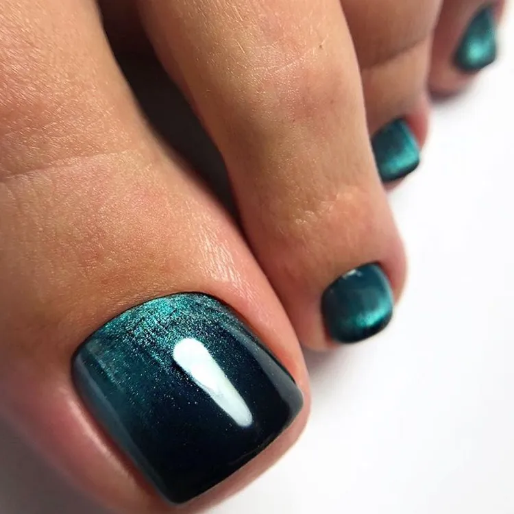 Tendencias en uñas del dedo del pie pedicura ojo de gato verde galaxia 2023