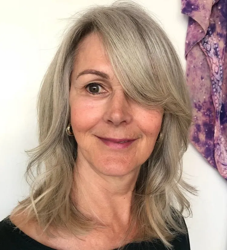 hairstyle for older woman with thick side fringe