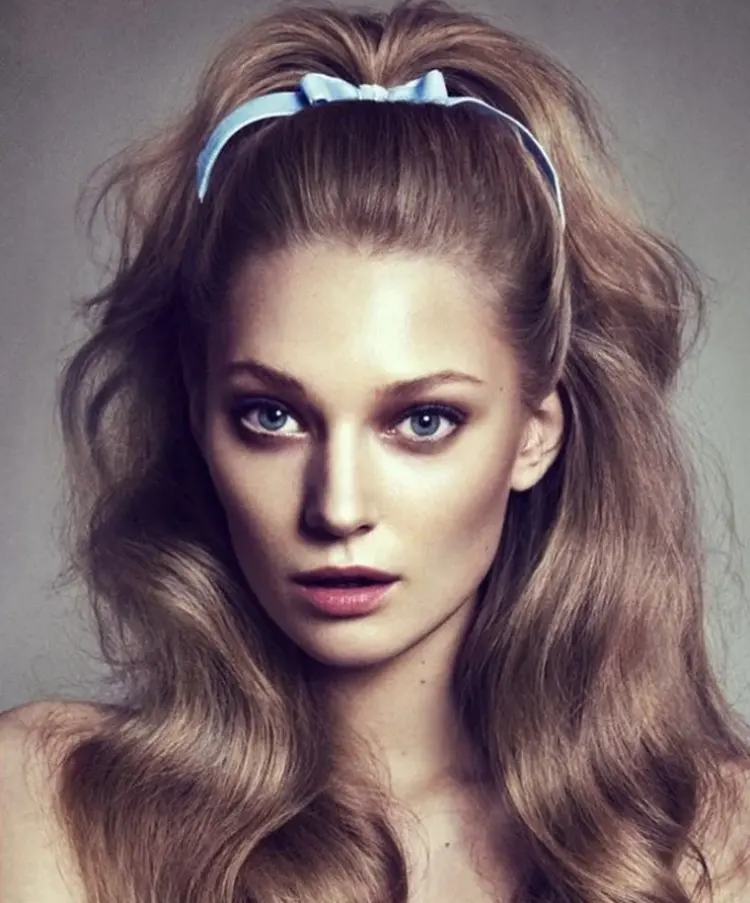 half up half down hairstyle with ribbon 70s inspired