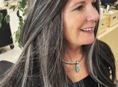long salt and pepper hair for women over 50