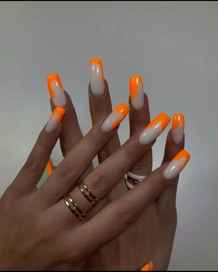 milky white base long square nail shape orange abstract neon french tips