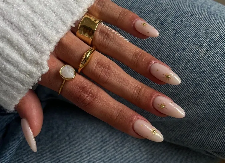 milky white nails with gold decorations prom 2023