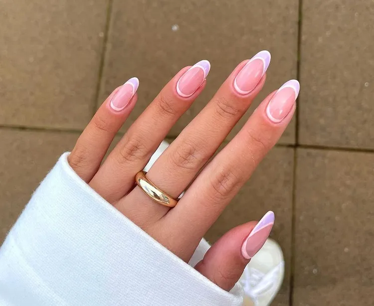 moon nails reverse french manicure with pastel colors