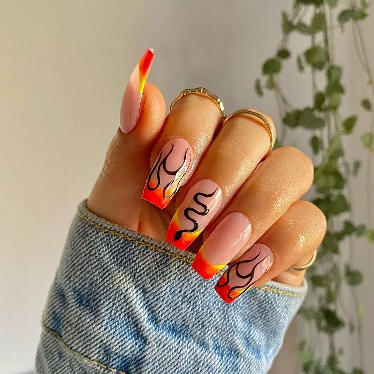 neon orange yellow ombre french tips black flames snake drawings