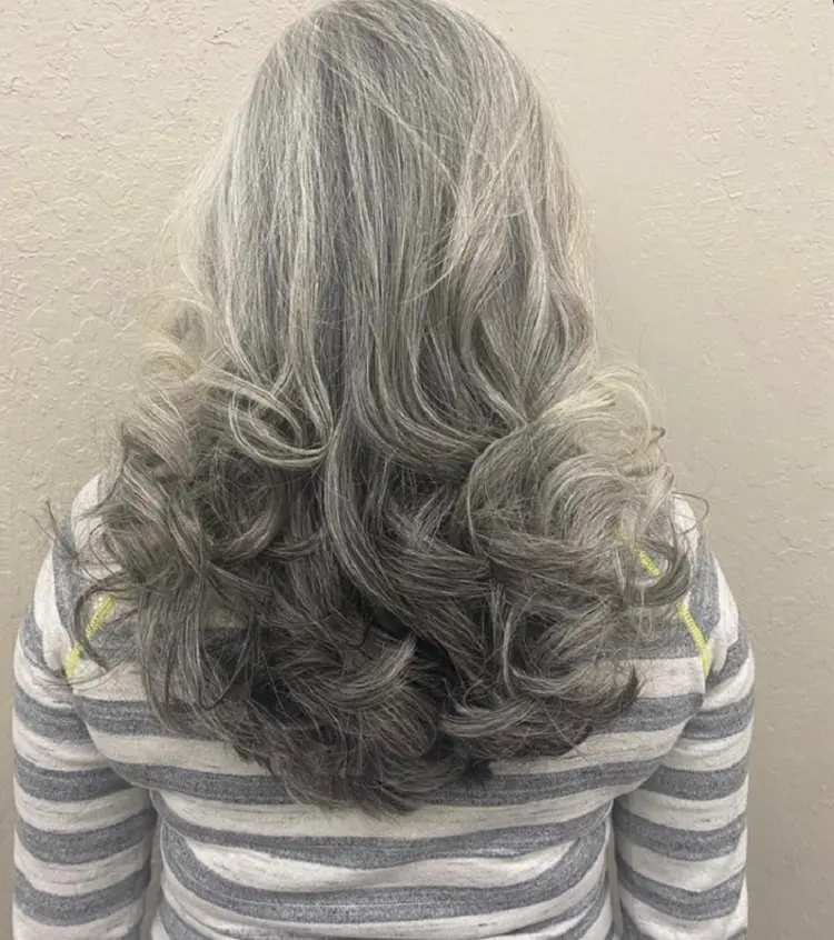 ombre hairstyle for women over 50 long last and pepper hair