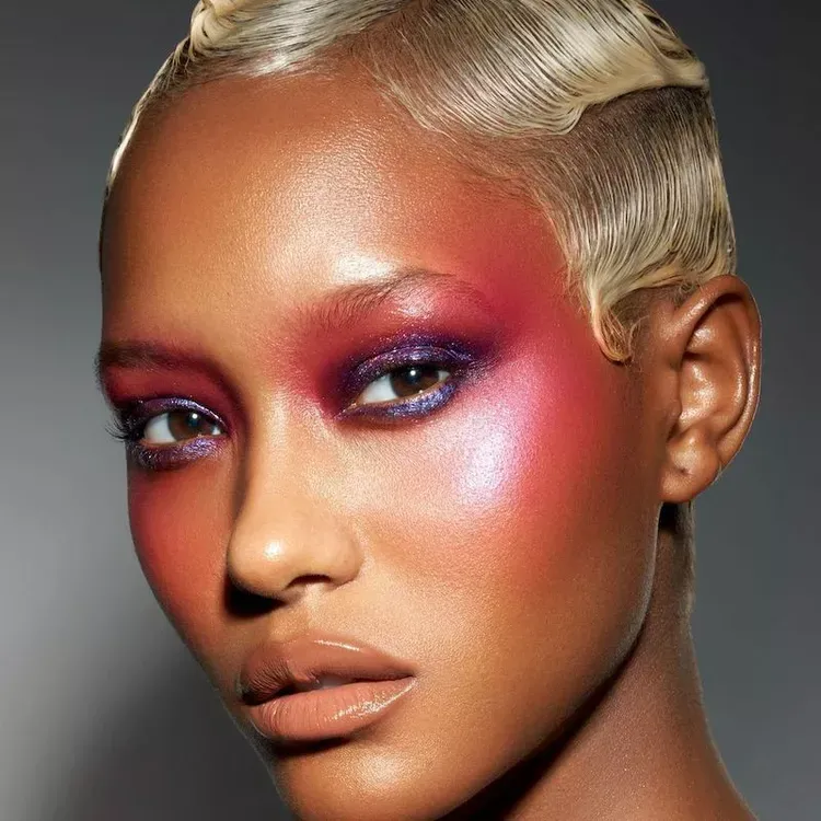 overdone pink blush high cheeks dewy skin coachella makeup