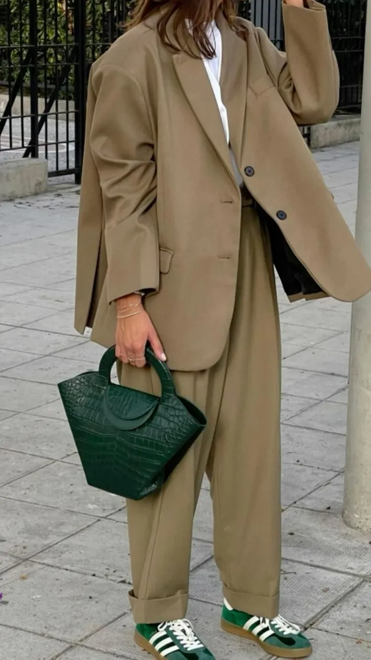 oversized beige wide leg pants matching green sneakers handbg casual street style for women