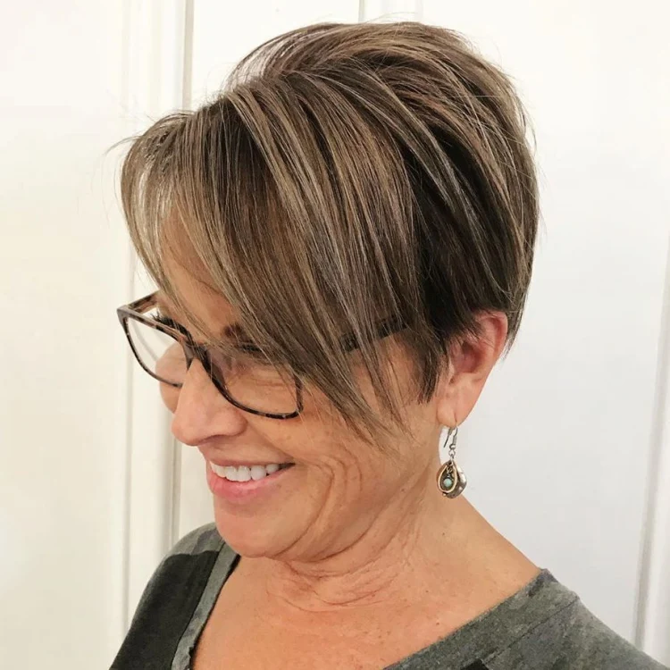 pixie cut with blonde balayage for older women
