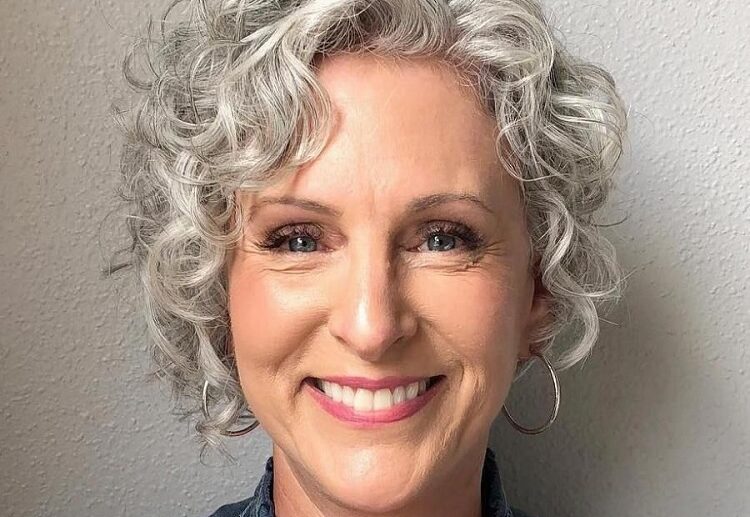 pixie haircut for curly hair with side bangs for women over 60
