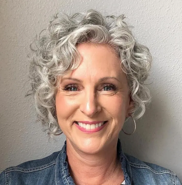 pixie haircut for curly hair with side bangs for women over 60