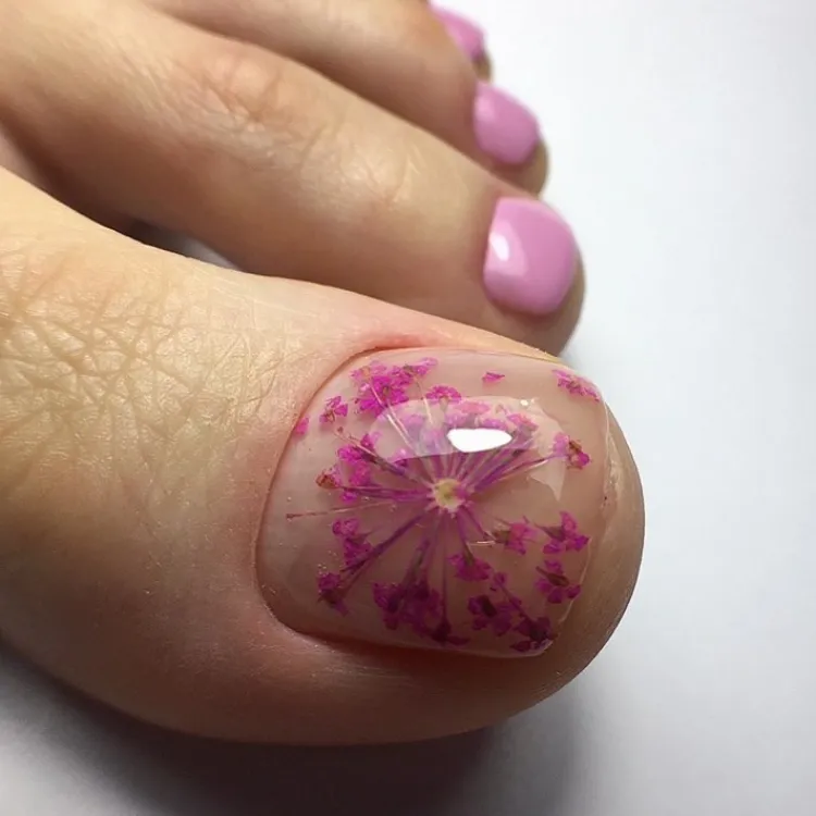 real flower pink polish pedicure toe nail trends ideas 2023