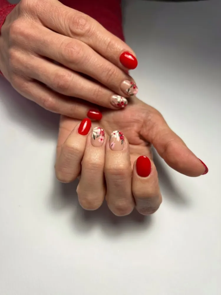 short oval nails mature women red manicure floral accents flower drawings