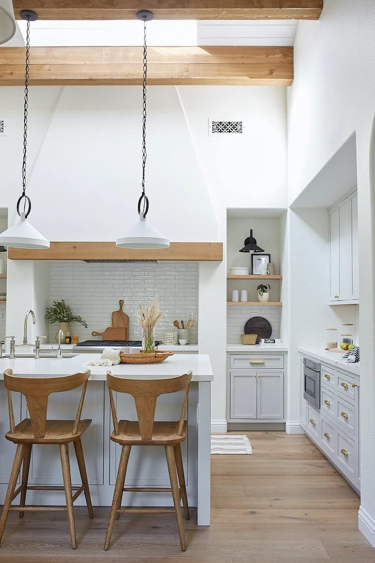 small california cool kitchen ceiling light wooden beams white cabinets minimalist aesthetic