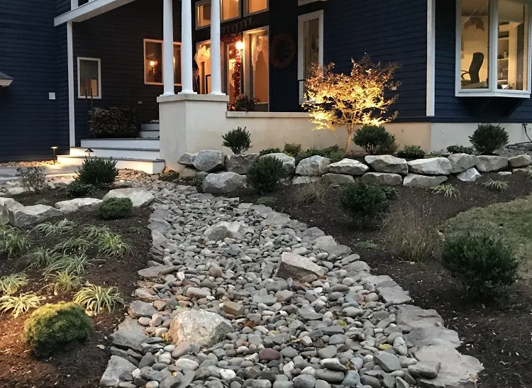 small river rocks landscaping ideas preventing weeds gardening tips