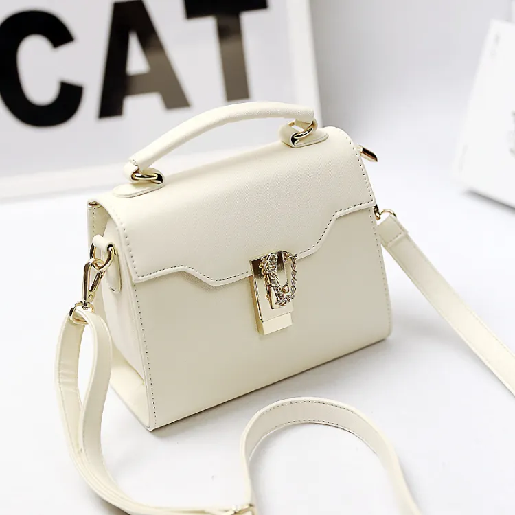 small white bag for young ladies which bag is suitable for my style what are the necessary accessories for my wardrobe for spring 2023 capsule wardrobe trending ideas