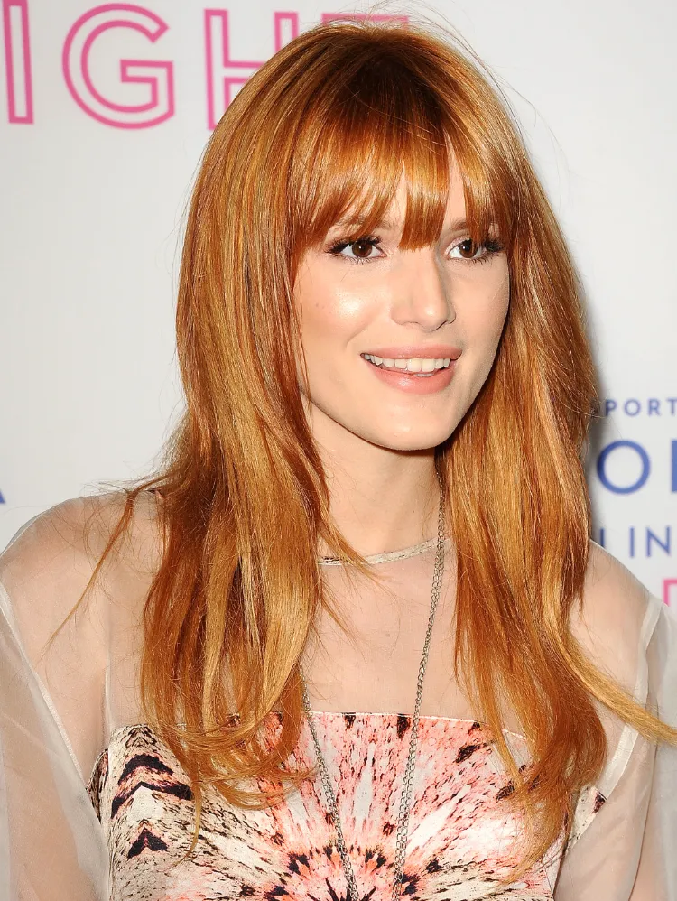 strawberry blonde hair option for short hairs with bangs medium length hair fringe stylsih look how to look like a celebrity trendy